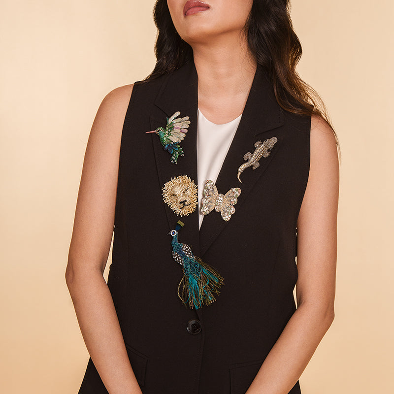 Model wearing handmade luxury Peacock Brooch