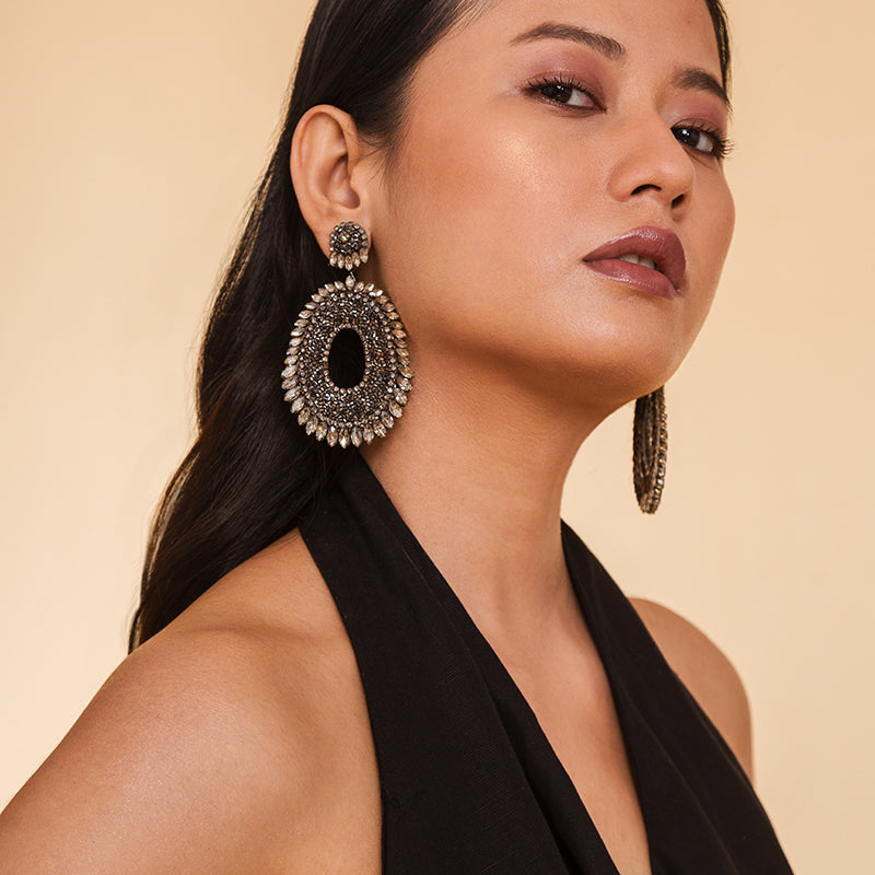 Model wearing Deepa Gurnani Handmade Kiki Earrings in Gunmetal